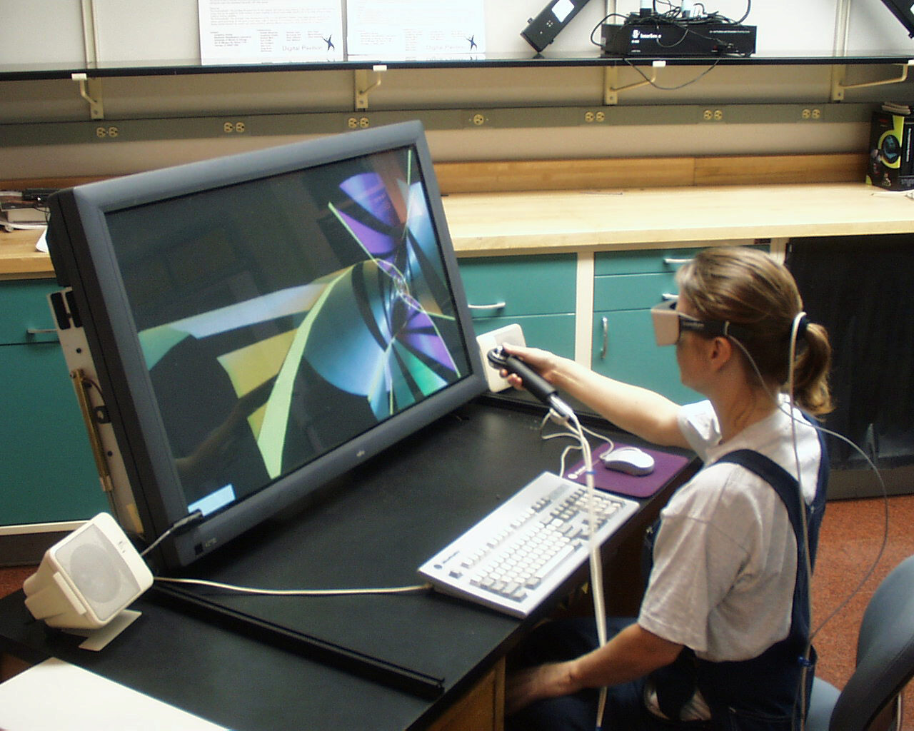 The ImmersaDesk3 - Experiences With A Flat Panel Display for Virtual Reality