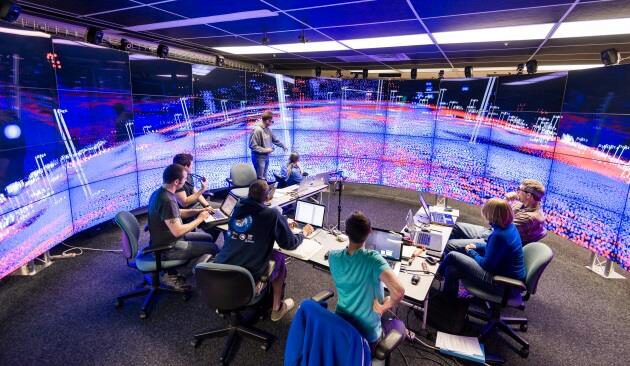 Omegalib: a Multi-View Application Framework for Hybrid Reality Display Environments