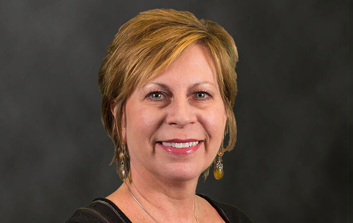 Dana Plepys receiving UIC CAPE Award at 2019 UIC Employee Recognition Award Ceremony and Reception