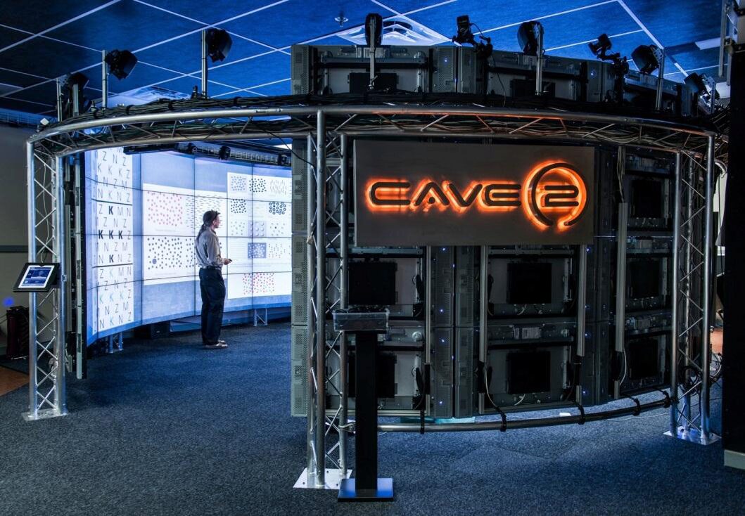 CAVE2: A Hybrid Reality Environment for Immersive Simulation and Information Analysis