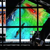 TeraVision: a High Resolution Graphics Streaming Device for Amplified Collaboration Environments