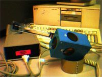 Ultrasonic Calibration of a Magnetic Tracker in a Virtual Reality Space