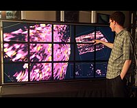 Vol-a-Tile - a Tool for Interactive Exploration of Large Volumetric Data on Scalable Tiled Displays